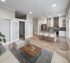 Virtual staged kitchen and living area with sliding barn doors